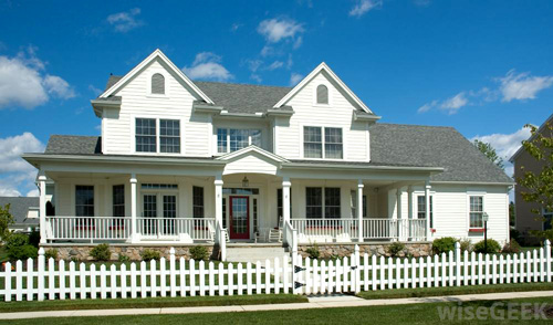 large-white-house-with-white-picket-fence